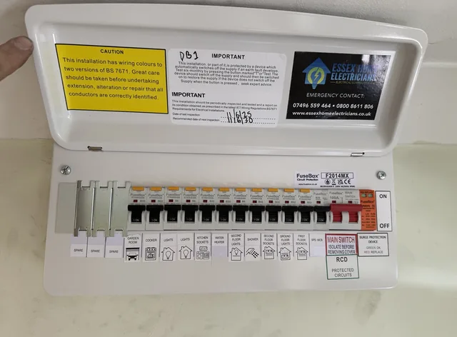 Labelled consumer unit with circuit breakers and Essex Home Electricians sticker