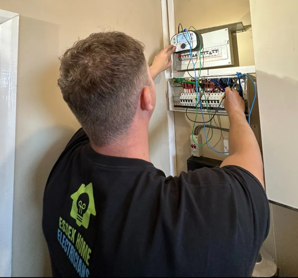 Essex Home Electricians team member testing a consumer unit
